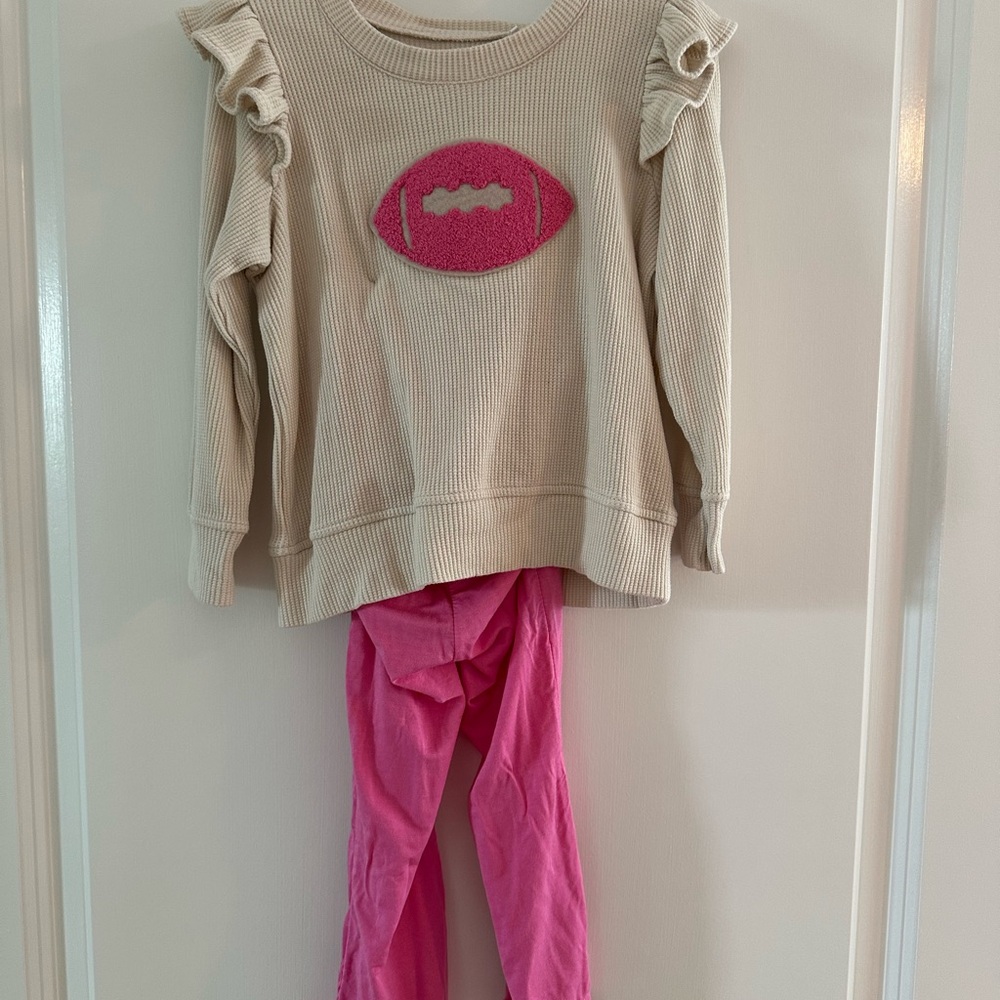 Cream Ruffle Sweater with Pink Leggings